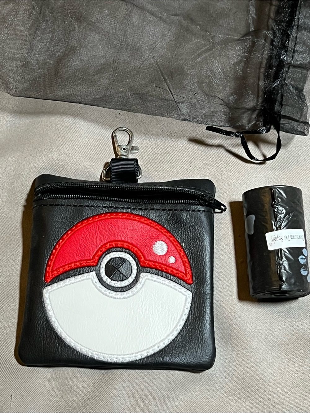 Pokemon doggie poop bag dispenser Black with Red & White Poké Ball Patch new 🆕